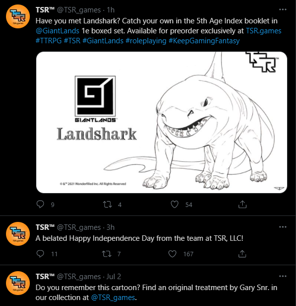 A screenshot of the TSR Games (@TSR_games) with a post: "Have you met Landshark? Catch your own in the 5th Age Index booklet in @GiantLands 1e boxed set. Available for preorder exclusively at TSR.games #TTRPG #TSR #GiantLands #roleplaying #KeepGamingFantasy"
Below a tweet: "A belated Happy Independence Day from the team at TSR, LLC!"
The previous tweet before that is from 2 July 2021.