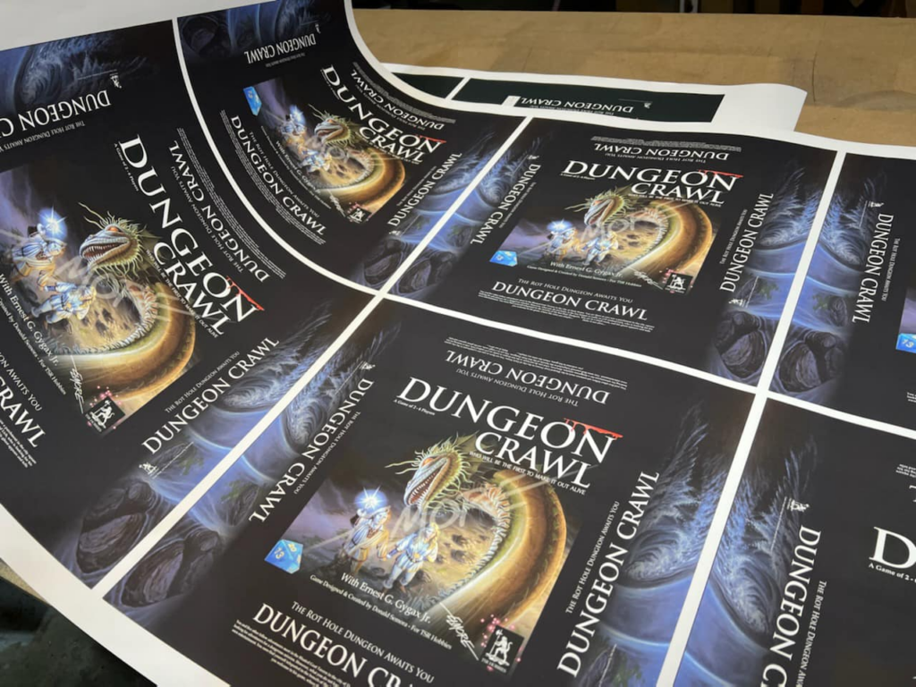 The zoom in of the printing of the Dungeon Crawl boxes, on soft paper with no marks for cuts, folds or bleeds, and the "Elmore" watermark clearly visible.